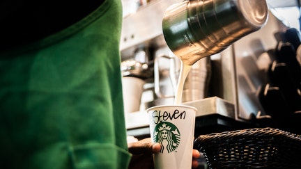 A barista pours steamed milk into a beverage cup marked 'Steven' inside a Starbucks Corp. cafe in the Sandton area of Johannesburg, South Africa, on Monday, Jan. 14, 2019. While South Africa's economy emerged from a recession in the third quarter, growth remains sluggish, hampered by subdued business confidence, higher taxes imposed by the government in February and a tight monetary-policy stance. Photographer: Waldo Swiegers/Bloomberg via Getty Images - Fox Business News