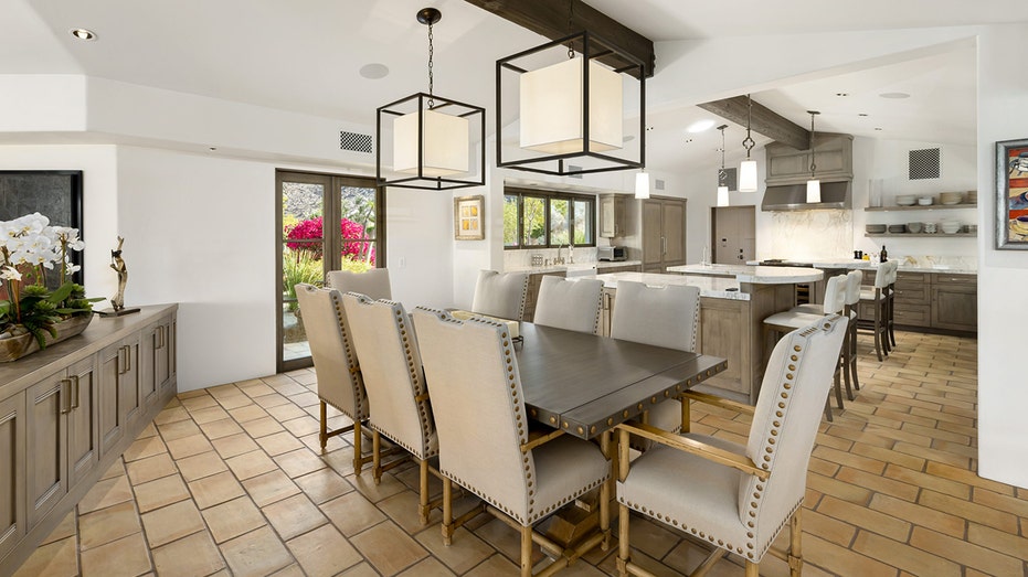 The dining room boasts a table big enough for eight.