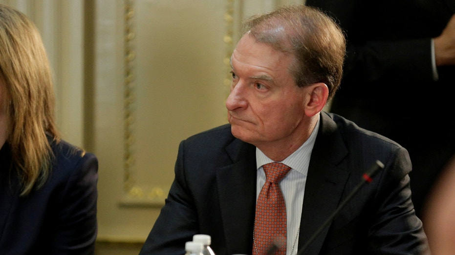 Patomak Global Partners LLC CEO Paul Atkins participates in a CEO strategy and policy discussion with President Donald Trump at the Eisenhower Execution Office Building in Washington, April 11, 2017.