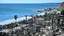 A view of fire-ravaged beach property overlooking the Pacific Ocean which burned as a result of the Palisades Fire on January 12, 2025 in Malibu, California. US officials warned &quot;dangerous and strong&quot; winds were set to push deadly wildfires further through Los Angeles residential areas January 12 as firefighters struggled to make progress against the flames. At least 16 people have been confirmed dead from blazes that have ripped through the city, reducing whole neighborhoods to ashes and leaving thousands without homes.