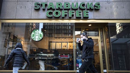 People pass by a Starbucks coffee shop in Manhattan, New York, United States on Jan. 15, 2025.  - Fox Business News