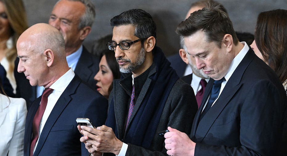 Amazon founder Jeff Bezos, Google CEO Sundar Pichai, and Tesla and SpaceX CEO Elon Musk attend the inauguration ceremony before Donald Trump is sworn in as the 47th US President in the US Capitol Rotunda in Washington, DC, on January 20, 2025. Saul Loeb/Pool/AFP via Getty Images