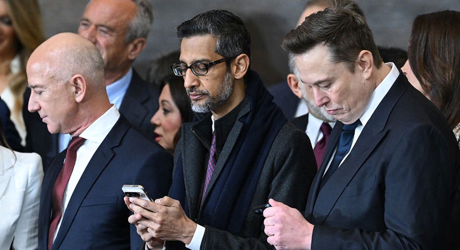 Amazon founder Jeff Bezos, Google CEO Sundar Pichai, and Tesla and SpaceX CEO Elon Musk attend the inauguration ceremony before Donald Trump is sworn in as the 47th US President in the US Capitol Rotunda in Washington, DC, on January 20, 2025. Saul Loeb/Pool/AFP via Getty Images