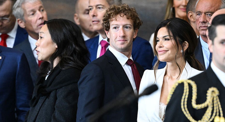Priscilla Chan, CEO of Meta and Facebook Mark Zuckerberg, and Lauren Sanchez attend the inauguration ceremony before Donald Trump is sworn in as the 47th US President in the US Capitol Rotunda in Washington, DC, on January 20, 2025. Saul Loeb/Pool/AFP via Getty Images