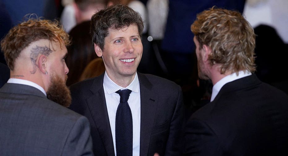 Sam Altman, chief executive officer of OpenAI Inc., center, with boxer Jake Paul and wrestler Logan Paul during the 60th presidential inauguration in Emancipation Hall of the US Capitol in Washington, DC, US, on Monday, Jan. 20, 2025. Donald Trump's Monday swearing-in marks just the second time in US history that a president lost the office and managed to return to power - a comeback cementing his place within the Republican Party as an enduring, transformational figure rather than a one-term aberration. Al Drago/Pool via REUTERS