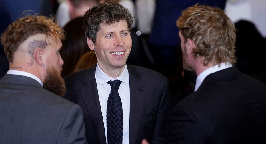Sam Altman, chief executive officer of OpenAI Inc., center, with boxer Jake Paul and wrestler Logan Paul during the 60th presidential inauguration in Emancipation Hall of the US Capitol in Washington, DC, US, on Monday, Jan. 20, 2025. Donald Trump's Monday swearing-in marks just the second time in US history that a president lost the office and managed to return to power - a comeback cementing his place within the Republican Party as an enduring, transformational figure rather than a one-term aberration. Al Drago/Pool via REUTERS