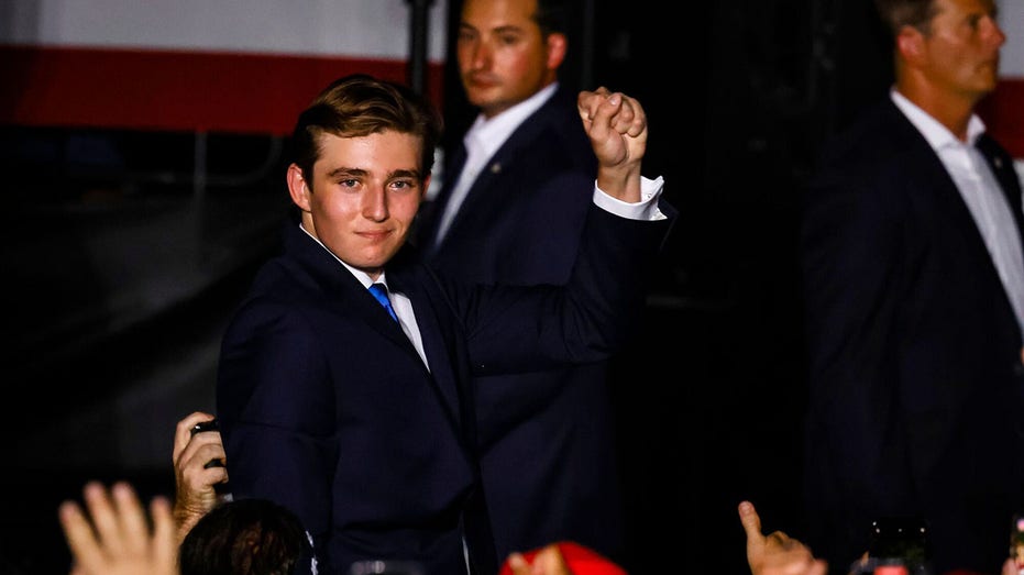 Barron Trump making a fist