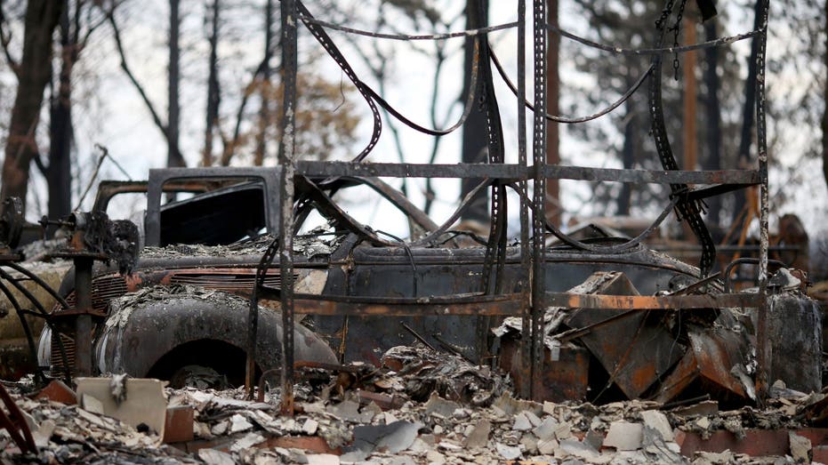 PARADISE , CA - NOVEMBER 27: A vintage car destroyed by the Camp Fire is seen in the city of Paradise, Calif., on Tuesday, Nov. 27, 2018. Many fire safety issues such as downed power lines, road conditions, hazardous materials, dangerous trees and more are preventing officials from reopening the city to the public. (Photo by Anda Chu/Digital First Media/East Bay Times via Getty Images)