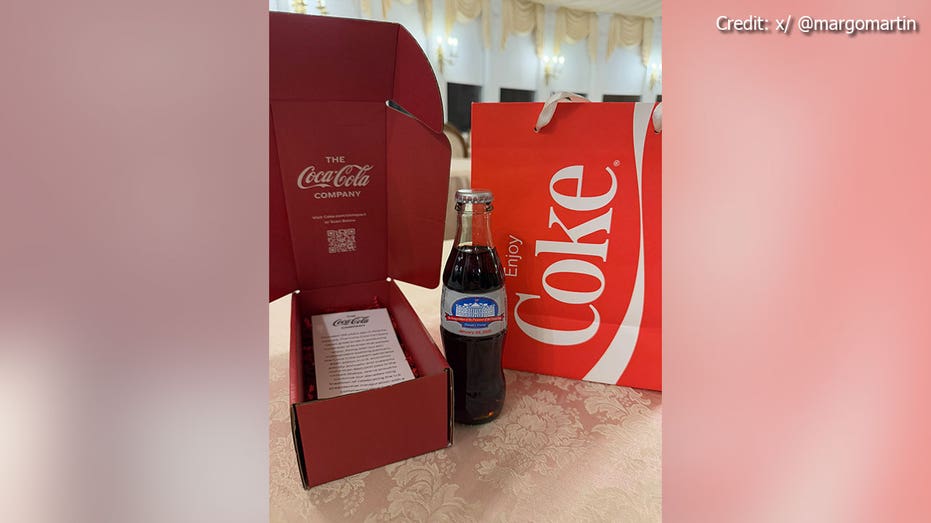 The first ever Presidential Commemorative Inaugural Diet Coke bottle is seen on display.