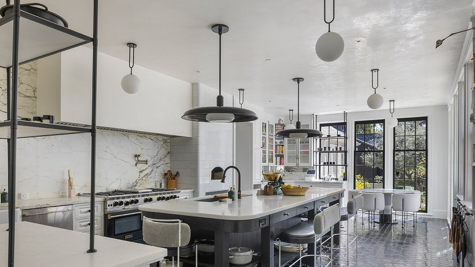 Paltrow's kitchen features a large center island and a breakfast nook.