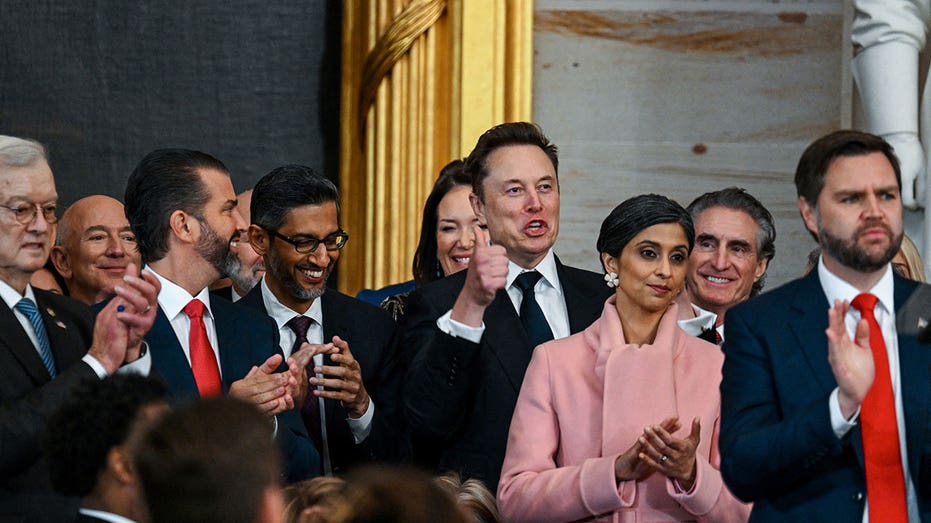 Jeff Bezos, Donald Trump Jr., Sundar Pichai, Elon Musk, Usha Vance, Doug Burgum and Vice President JD Vance applaud during the inauguration of Donald Trump as the 47th president of the United States takes place inside the Capitol Rotunda of the U.S. Capitol building in Washington, D.C., Monday, January 20, 2025. It is the 60th U.S. presidential inauguration and the second non-consecutive inauguration of Trump as U.S. president. Kenny Holston/Pool via REUTERS