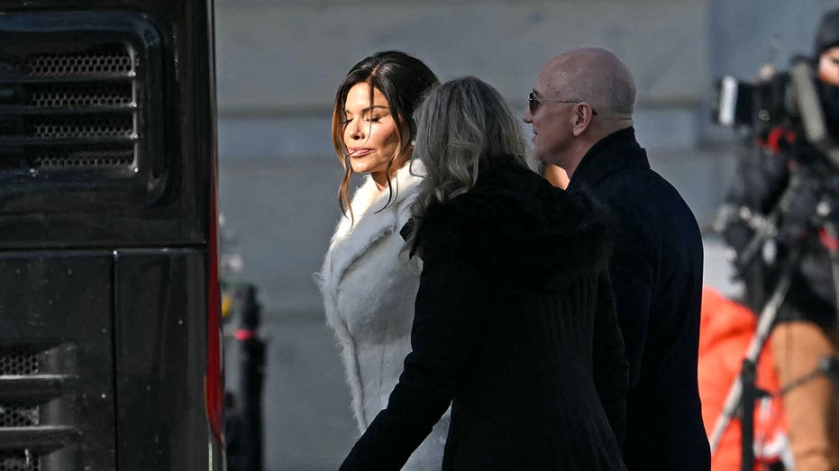 US businessman Jeff Bezos (R) and his parter Lauren Sanchez (L) arrive for the inauguration ceremony where Donald Trump will sworn in as the 47th US President in the US Capitol Rotunda in Washington, DC, on January 20, 2025. (Photo by ANDREW CABALLERO-REYNOLDS / AFP) (Photo by ANDREW CABALLERO-REYNOLDS/AFP via Getty Images)