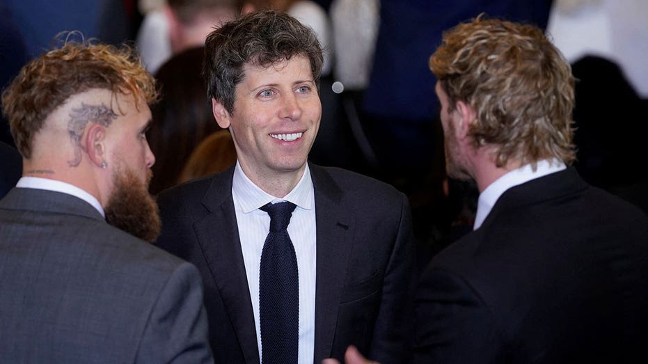 Sam Altman, chief executive officer of OpenAI Inc., center, with boxer Jake Paul and wrestler Logan Paul during the 60th presidential inauguration in Emancipation Hall of the US Capitol in Washington, DC, US, on Monday, Jan. 20, 2025. Donald Trump's Monday swearing-in marks just the second time in US history that a president lost the office and managed to return to power - a comeback cementing his place within the Republican Party as an enduring, transformational figure rather than a one-term aberration. Al Drago/Pool via REUTERS