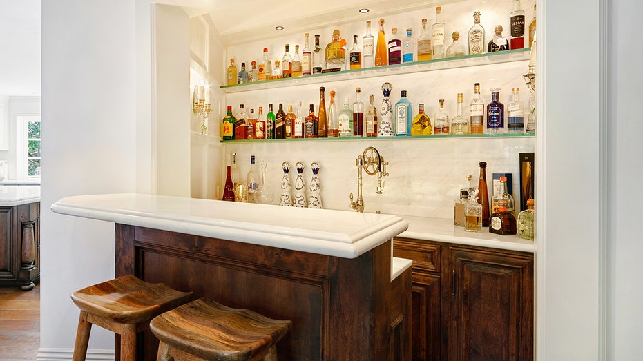 The family room also features a fully stocked wet bar.