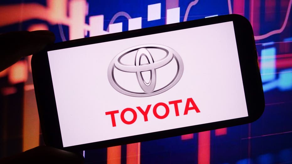 POLAND - 2024/11/18: In this photo illustration, the Toyota company logo can be seen displayed on a smartphone screen. (Image credit by Piotr Swat/SOPA Images/LightRocket via Getty Images)