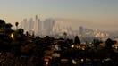 A layer of smog lingers above the downtown Los Angeles skyline on December 6, 2024. The National Weather Service on December 4 issued an air quality alert for the greater Los Angeles area until midnight on December 6. (Photo by ETIENNE LAURENT / AFP) (Photo by ETIENNE LAURENT/AFP via Getty Images)  - Fox Business News