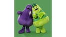 Grimace and Uncle O&apos;Grimacey holding Shamrock Shakes