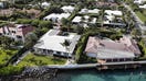 Single-family houses in Palm Beach, Florida, U.S., on Wednesday, April 7, 2021. Purchase contracts for single-family houses priced at $10 million or more surged 306% in March from a year earlier, the biggest gain since the pandemic started, appraiser Miller Samuel Inc. and brokerage Douglas Elliman Real Estate said in a report. Photographer: Marco Bello/Bloomberg via Getty Images
