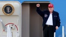 President Donald Trump gestures as he departs Air Force One at Miami International Airport on Feb. 19 in Miami, Florida. 