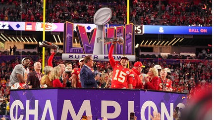 Kansas City Chiefs Patrick Mahomes (15) celebrates victory with the Vince Lombardi trophy while interviewed y CBS broadcaster Jim Nantz vs San Francisco 49ers at Allegiant Stadium. 
Las Vegas, NV 2/11/2024