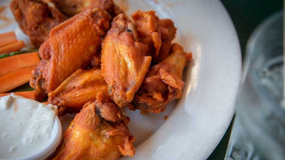 Chicken wings arranged at a restaurant in Hastings-on-Hudson, New York, US, on Friday, Feb. 10, 2023. The price of chicken wings has plunged 22% from last January while avocado prices are down 20% versus a year ago due to increased plantings and strong crop yields. Photographer: Tiffany Hagler-Geard/Bloomberg via Getty Images