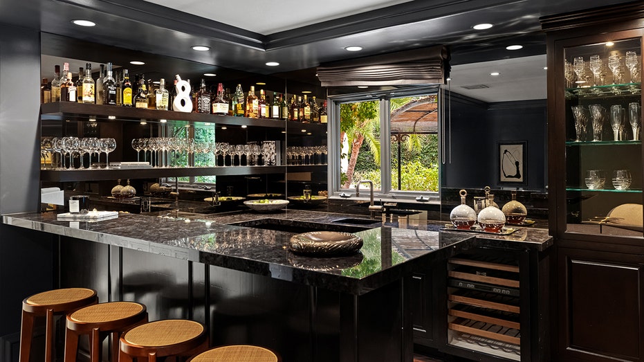 The family room also features a fully stocked bar.