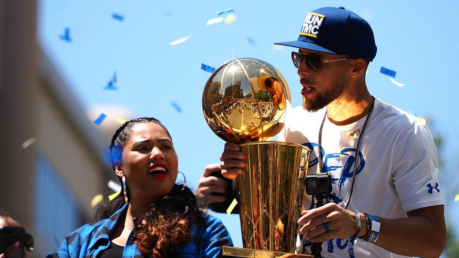 Stephen and Ayesha Curry celebrate