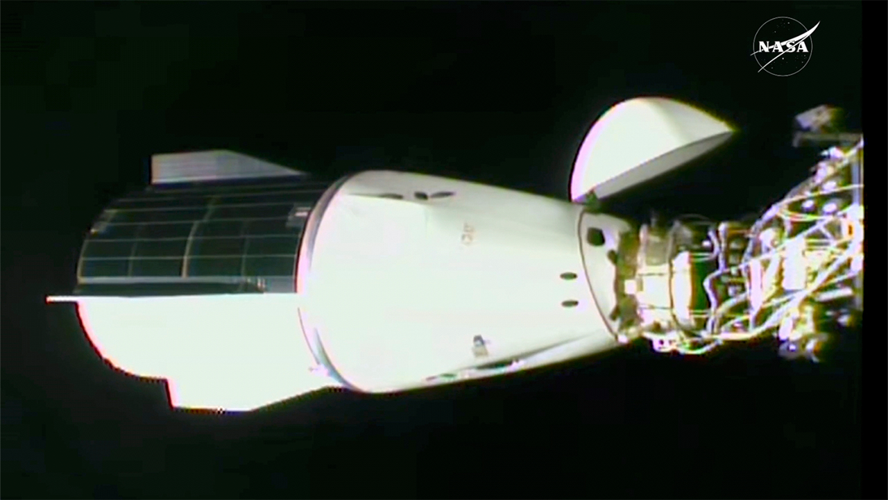 NASA's stuck astronauts welcome replacements who arrived to space station on SpaceX capsule