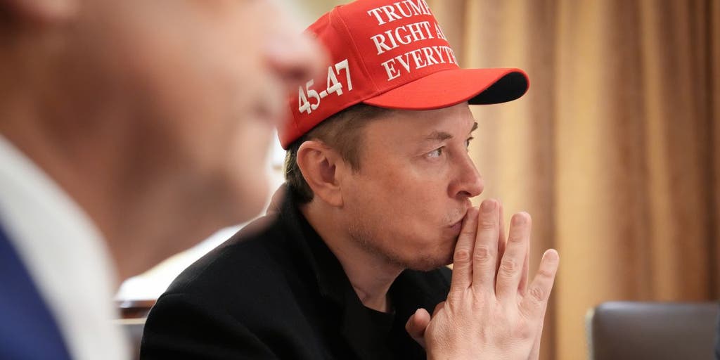https://a57.foxnews.com/static.foxbusiness.com/foxbusiness.com/content/uploads/2025/03/1024/512/elon-musk-doge-maga-hat.jpg?ve=1&tl=1