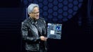 18 March 2025, USA, San Jose: Jensen Huang, head of the chip company Nvidia, presents the AI computer DGX Station at the developer conference GTC.