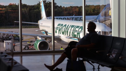 Frontier Airlines plane seen at Cancun International Airport. On Wednesday, December 08, 2021, in Cancun International Airport, Cancun, Quintana Roo, Mexico.  - Fox Business News