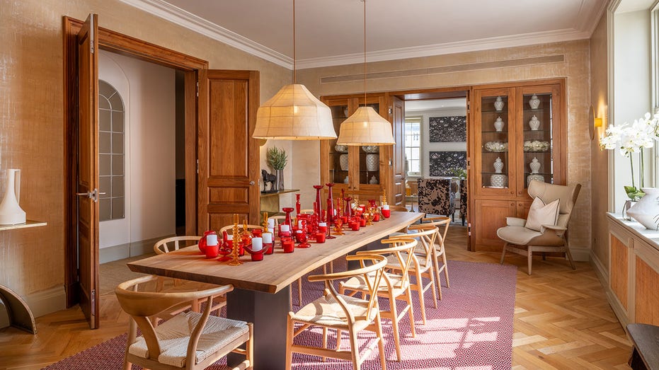 The dining room is big enough for table fit for 10 diners, as well as built-in shelving.