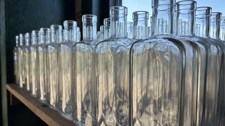 Empty whiskey bottles at Nearest Green Distillery in Shelbyville, TN.