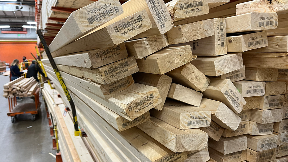 A stack of lumber at a hardware store.