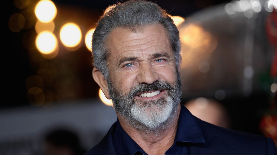 Mel Gibson is smiling