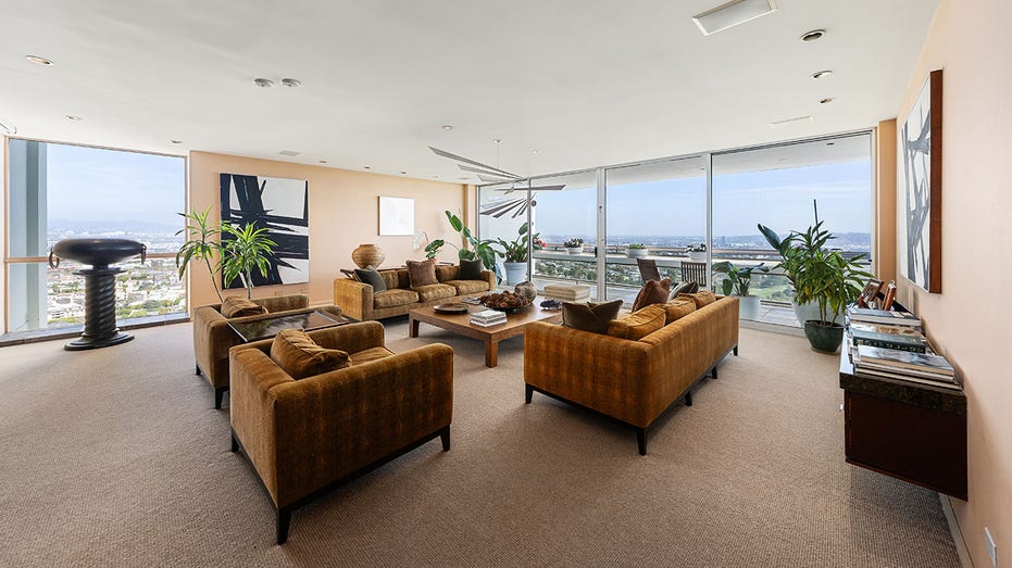 Michael Douglas and Catherine Zeta-Jones living room with a wall of windows.