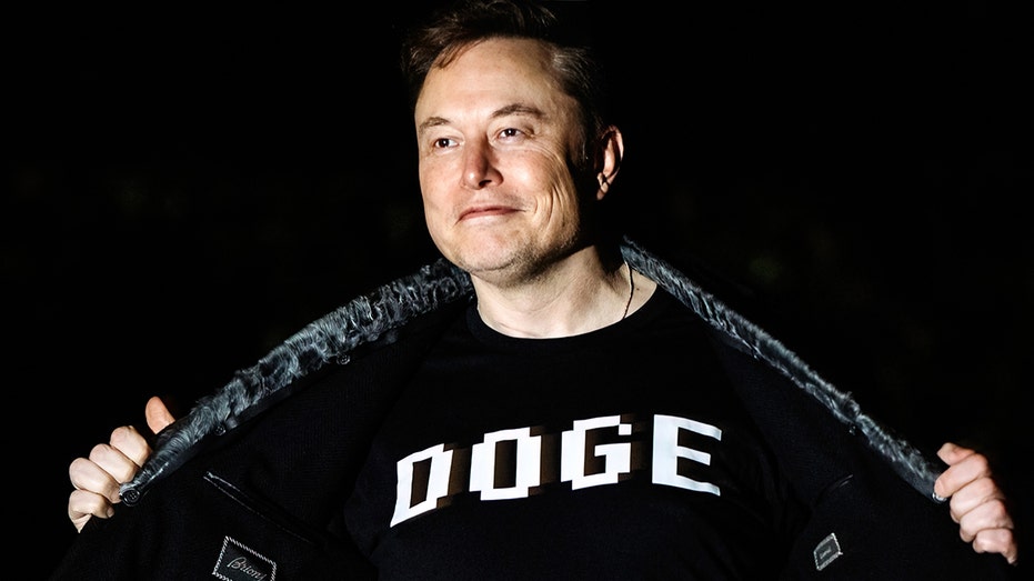 Elon Musk shows off DOGE shirt