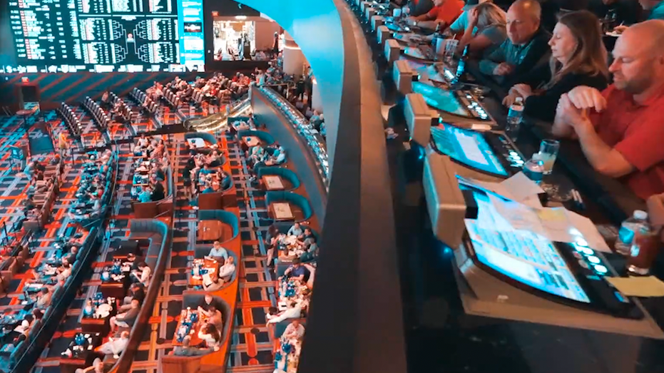 A sportsbook with people in their seats