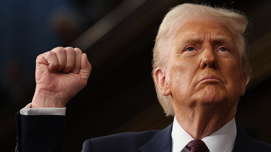 Trump raises his fist during speech to Congress