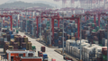 Gantry cranes stand near shipping containers at Yangshan Port outside of Shanghai, China, April 15, 2025. - Fox News