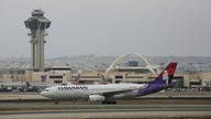 Hawaiian Airlines flight declares emergency after a mobile device gets stuck in seat - Fox News