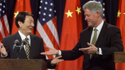 President Bill Clinton and Chinese Premier Zhu Rongji conclude their news conference at the White House April 8. Clinton and Zhu failed to strike a deal on China's joining the World Trade Organisation (WTO) but said they made significant progress and aimed to finish talks this year
??»