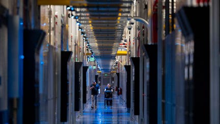 ASHBURN, VA - MAY 9: People walk through the hallways at Equinix Data Center in Ashburn, Virginia, on May 9, 2024. (Amanda Andrade-Rhoades for The Washington Post via Getty Images)  - Fox Business News
