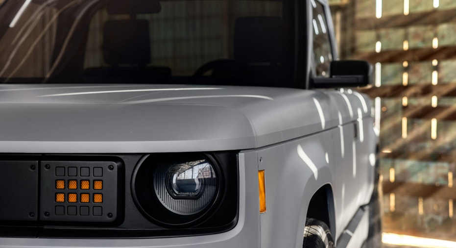 A closeup of a headlight of Slate Auto's electric pickup truck.