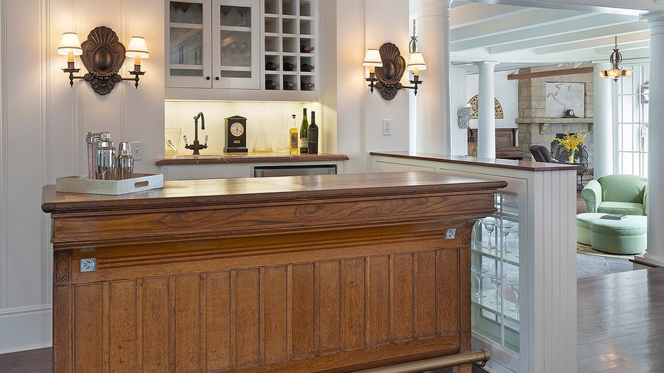 The breakfast room also features a wetbar with seating.