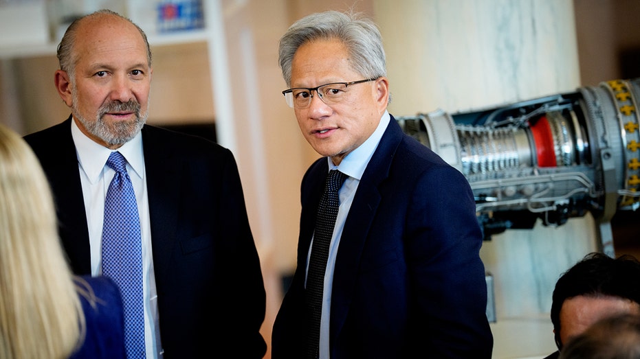 Commerce Secretary Howard Lutnick and Nvidia CEO Jensen Huang