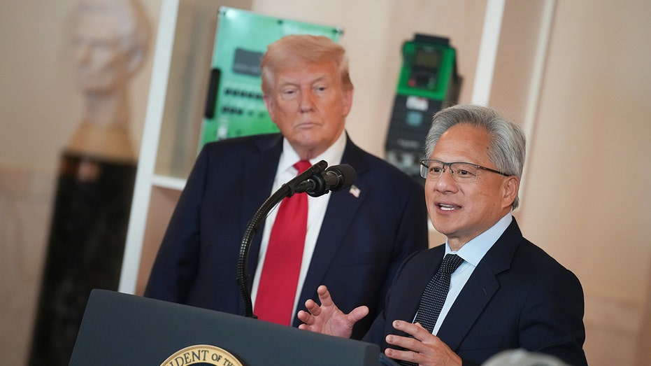 US President Donald Trump listens to the CEO of Nvidia Jensen Huang speaks