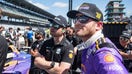 Juncos Hollinger Racing driver Conor Daly (76) stands next to his car Saturday, May 17, 2025, during qualifying for the 109th running of the Indianapolis 500 at Indianapolis Motor Speedway. - Fox Business News