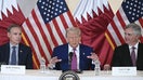 US President Donald Trump (C) is flanked with Boeing CEO Kelly Ortberg (L) and CEO of GE Aerospace Larry Culp during a breakfast with business leaders in Doha on May 15, 2025. (Photo by Brendan SMIALOWSKI / AFP) (Photo by BRENDAN SMIALOWSKI/AFP via Getty Images)