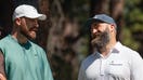 Travis Kelce and brother Jason Kelce talk on the 4th tee during the first round of the American Century Celebrity Championship golf tournament at Edgewood Tahoe Golf Course in Stateline, Nev., Friday, July 12, 2024. - Fox Business News